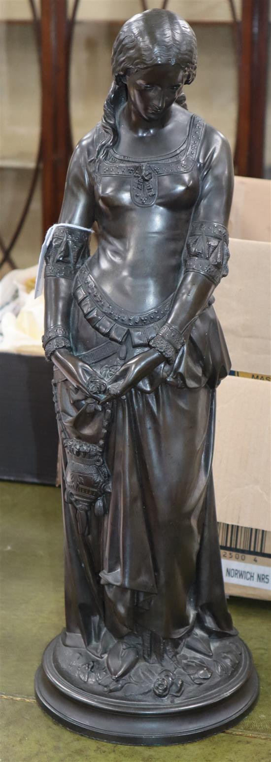 After Boisseau. A large cold cast resin bronzed figure of a maiden, indistinctly signed height 56cm